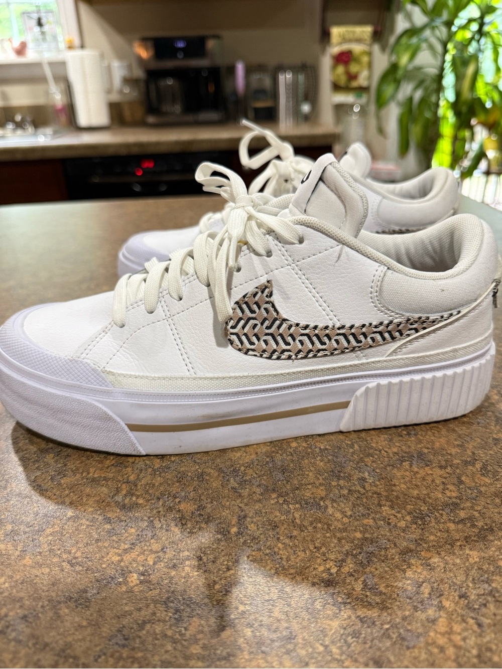 Nike Sneakers with Patterned Swoosh